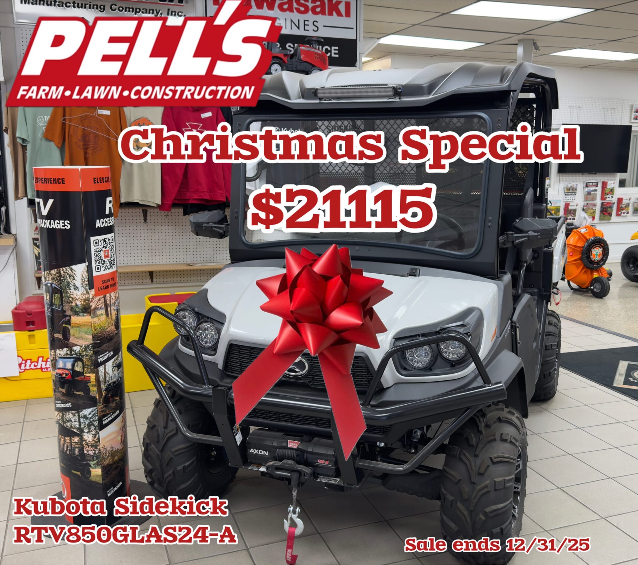 Kubota Sidekick RTVXG850GLAS24-A utility vehicle with factory-installed glass windshield, premium roof, LED light bar, Warn Axon 4500 lb winch, and electric hydraulic bed lift on display at Pells Pells farm service